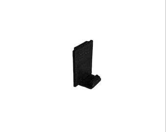 May include: A small, black, L-shaped object, possibly a hook or bracket, is set against a white background. The object has a rectangular main body and a smaller, textured projection at the base, suggesting a functional design.