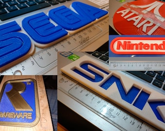 Logo sign Nintendo Atari SNK Sega Konami Namco Rareware Rare Bandai Capcom Data East Mattel Electronics Dataeast Tiger electronics