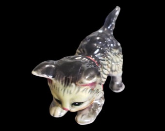 Vintage 1950s tiger striped playing kitten with bow ceramic figuerine tiger striped kitten at play porcelain