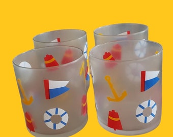 Set of 4 Nautical frosted rocks glasses in red, yellow, blue and white with bells, anchors, flags and ships