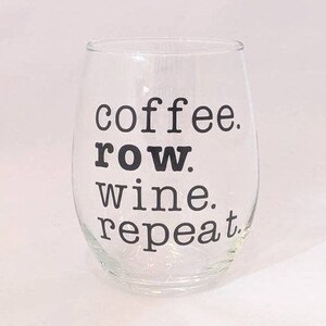 May include: Clear glass wine glass with black text that reads "coffee. row. wine. repeat."