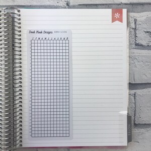 May include: A clear plastic sheet with a grid of squares and the months of the year labeled across the top. The sheet is labeled "Dook Plook Designs DPD-1336".