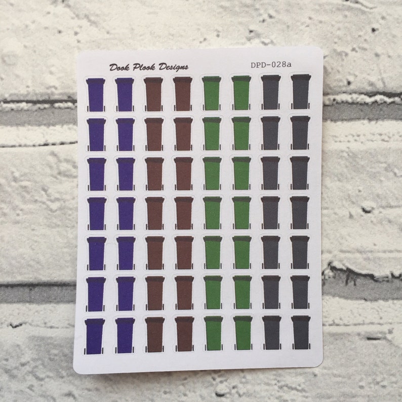 May include: A sheet of stickers featuring 48 different colored trash cans. The stickers are arranged in four rows of 12. The trash cans are purple, brown, green, and gray.