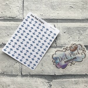 May include: A sheet of blue dumbbell stickers with the text "Dook Plook Designs" and "DPD-1219" on a white background.