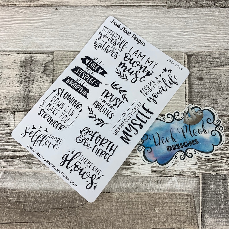 May include: A set of white stickers with black text and graphics. The stickers feature motivational quotes such as "I am my own muse", "Slowing down can make you stronger", "Go forth & be fierce", and "Trust in your abilities". The stickers are designed by Dook Plook Designs.