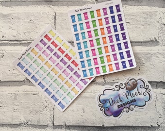 May include: Two sheets of colorful recycling bin stickers. Each sheet has 6 rows of 7 stickers, with each sticker featuring a different color recycling bin. The sheets are labeled "Dood Plank Designs" and have the product codes "DPD-031" and "DPD-030".