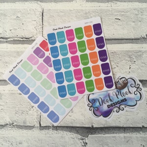May include: Three sheets of colorful round stickers with the word "SYNS" printed on each sticker. The stickers are in various colors, including blue, green, pink, orange, and purple. The sheets are labeled "Dook Plook Designs" and have a product code.