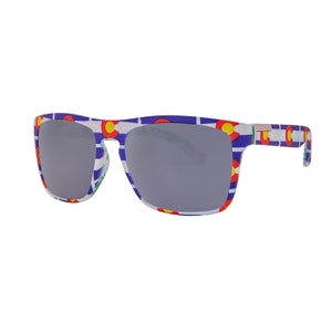 May include: Sunglasses with a white frame and blue, red, and yellow Colorado flag pattern. The lenses are gray.