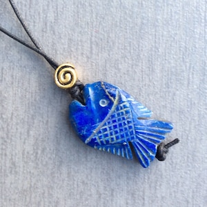 Lapis lazuli Hand carved fish pendant. Blue Afghan Lapis lazuli pendant. Irish made gift jewelry Irish pendant Celtic gold spiral bead.