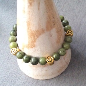 Connemara marble bracelet with gold or silver Celtic spiral beads. Irish Jewelry gift craft. Mens women Unisex bracelet. Patricks Day