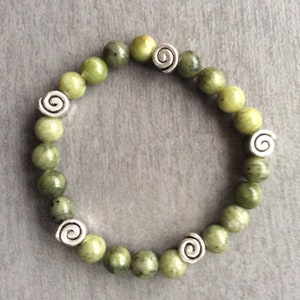 Connemara marble bracelet with gold or silver Celtic spiral beads. Irish Jewelry gift craft. Mens women Unisex bracelet. Patricks Day