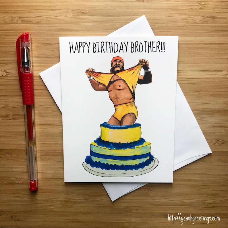 May include: A birthday card featuring a cartoon illustration of a wrestler in a yellow and black costume, standing in a three-tiered cake. The card has the text "Happy Birthday Brother!!!" printed on it.