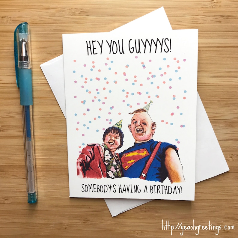 May include: A birthday card with a white background and colorful confetti. The card features a drawing of two people wearing party hats. The text on the card reads 'Hey you guyyys!' and 'Somebody's having a birthday!' The bottom of the card has the website address 'http://yeaohgreetings.com'