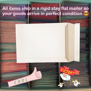 May include: A close-up of a white envelope with a brown flap, inside a drawer filled with colorful envelopes. The text "All items ship in a rigid stay flat mailer so your goods arrive in perfect condition" is visible at the top of the image. The text "COOL" is visible in the lower left corner of the image. The text "VICTORY" is visible in the lower right corner of the image.
