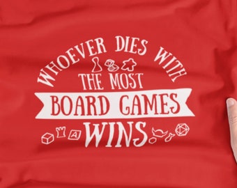 Whoever Dies with the Most Board Games Wins Mens/Unisex T-shirt | shirts for board gamer geeks, strategy tabletop gamers, geeky gamer nerds