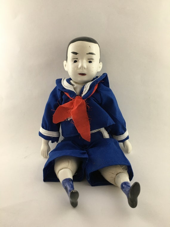 porcelain sailor boy doll