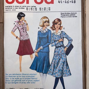 May include: Vintage Burda sewing pattern 21300 featuring three women's fashion designs. The pattern includes a jacket and skirt, a dress with a Peter Pan collar, and a floral print skirt suit. The pattern is available in sizes 12-16 and 18-40.