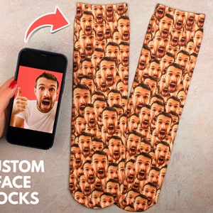 May include: A pair of custom face socks with a repeating pattern of a man's face. The socks are white with a black outline around each face. The man in the photo is making a surprised expression.