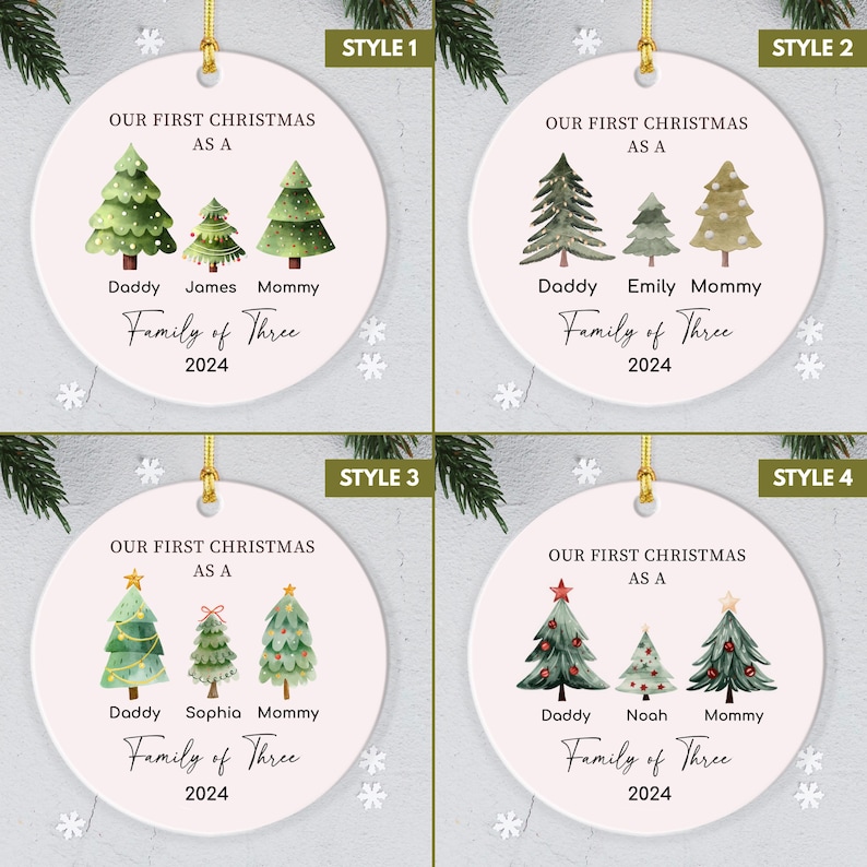 May include: Four different styles of personalized Christmas ornaments featuring a family of three with a watercolor-style illustration of three Christmas trees. The text reads "Our First Christmas as a Family of Three" with the year 2024.