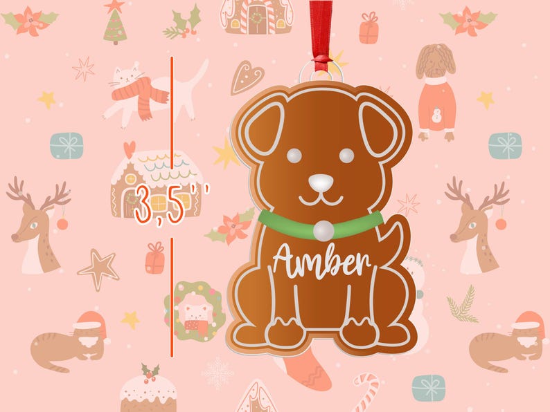 May include: A gingerbread dog ornament with a green collar and the name "Amber" written in white. The ornament is 3.5 inches tall and is perfect for hanging on a Christmas tree.