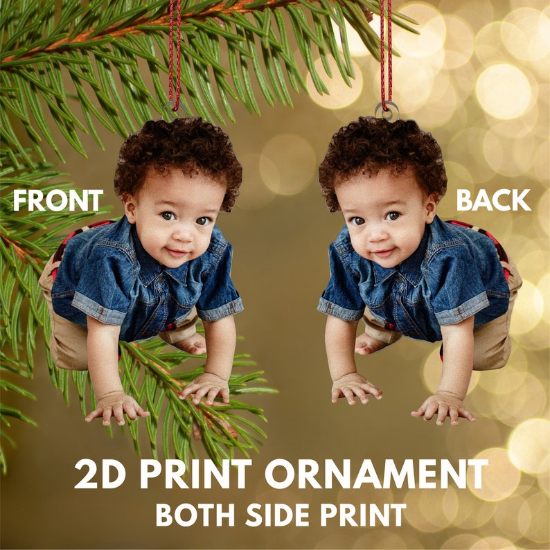 May include: A 2D printed Christmas ornament featuring a photo of a young child crawling. The ornament is printed on both sides. The front side shows the child crawling towards the left, while the back side shows the child crawling towards the right.