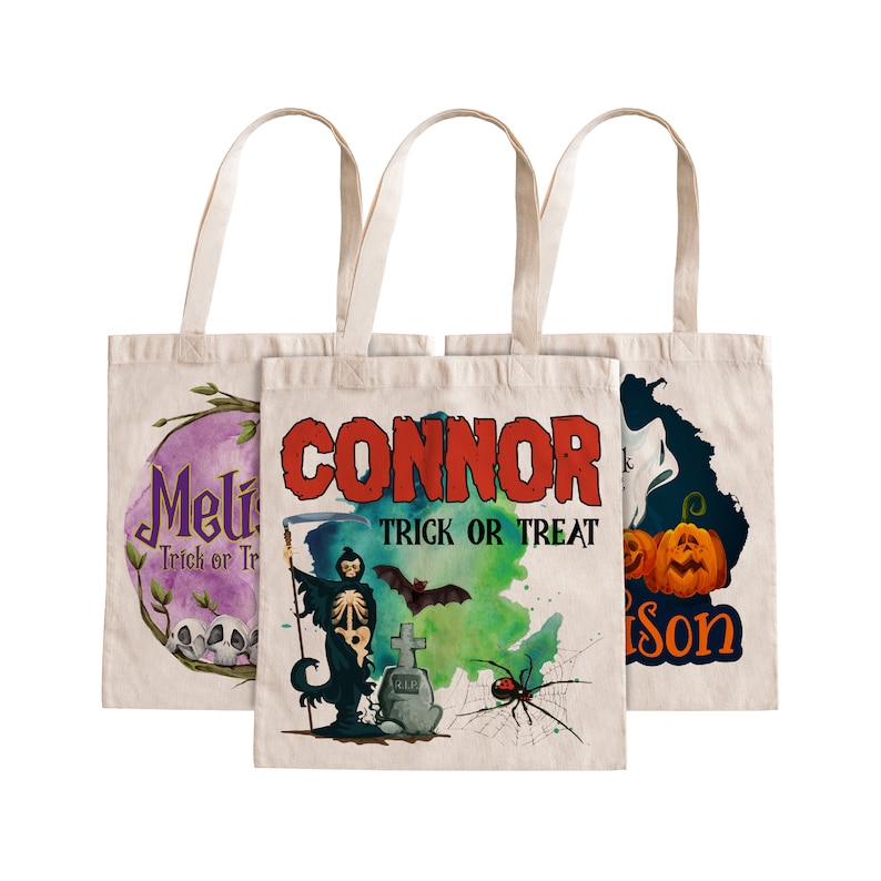 May include: Three white canvas tote bags with Halloween designs. The first bag has a purple and pink design with the text "Mel Trick or Treat". The second bag has a green and blue design with the text "Connor Trick or Treat". The third bag has a black and blue design with the text "Tyson Trick or Treat".