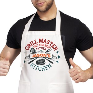 May include: White apron with a red, blue, and white logo that says "Grill Master and the Best Father Est. 2011 Jason's Kitchen".