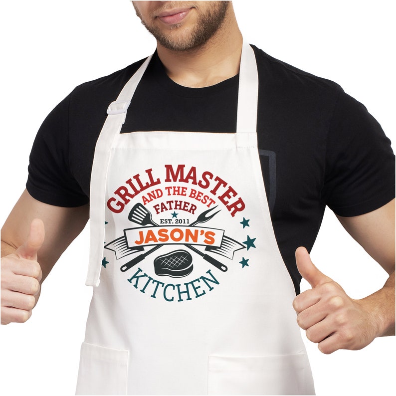 May include: White apron with a red, blue, and white logo that says "Grill Master and the Best Father Est. 2011 Jason's Kitchen".