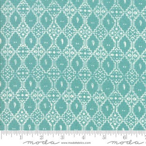 May include: Teal and white patterned fabric with a geometric design. The fabric features a repeating pattern of diamond shapes, paisley motifs, and decorative elements. The fabric is suitable for quilting, sewing, and crafting projects.