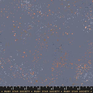 May include: A fabric with a dark blue-gray background, speckled with small, irregular dots in shades of orange, white, and light blue. The text "RUBY STAR SOCIETY" is printed at the bottom.