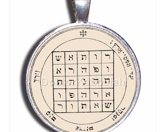 May include: A silver pendant with a beige background and black Hebrew lettering. The pendant features a square grid with Hebrew letters inside each square. The text around the grid reads "72 - 1998 - 72" and "ל-ה-ו-ד-י-ה-ל".