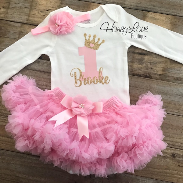 Personalized 1st Birthday outfit, one number 1 tiara crown princess gold glitter shirt bodysuit, light pink tutu skirt flower headband