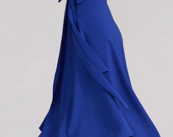 May include: A vibrant royal blue midi skirt featuring a high-waisted design with a matching fabric tie belt at the waist. The skirt has a flared, A-line silhouette that falls below the knees, crafted from a smooth, solid-colored fabric.