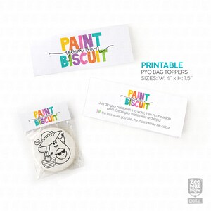 May include: Printable "Paint Your Own Biscuit" bag toppers with a colorful design. The toppers are 4 inches wide and 1.5 inches high. The image shows a cookie in a bag with a design of a person wearing a hat and sunglasses.
