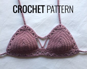 May include: A mauve crochet bikini top with the text "CROCHET PATTERN" in black. The top features a triangle shape with a decorative openwork design and thin straps.