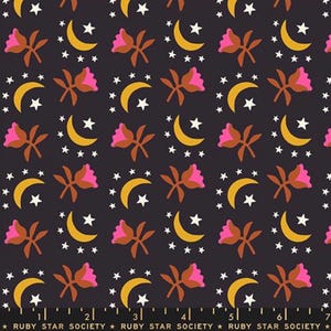 May include: Dark fabric with a repeating pattern of pink flowers, yellow crescent moons, and white stars. The text "RUBY STAR SOCIETY" is at the bottom. This design is suitable for quilting, apparel, or home decor projects.