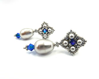"Tudor pearl" ear studs with light gray and capri blue Swarovski crystals
