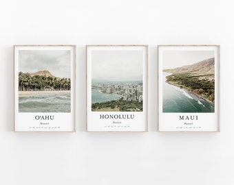 May include: Three framed prints with scenic views of Oahu, Honolulu, and Maui, Hawaii. Each print features the name of the island and its location in Hawaii.