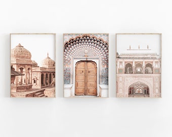 May include: A set of three prints featuring architectural details from India. The first print shows a pink sandstone building with intricate carvings and domes. The second print shows a large, ornate doorway with a peacock design. The third print shows a white building with arches and a detailed facade.