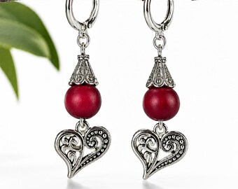Here’s an Etsy version that fits your shop style and highlights the red wooden beads and antique silver hearts: