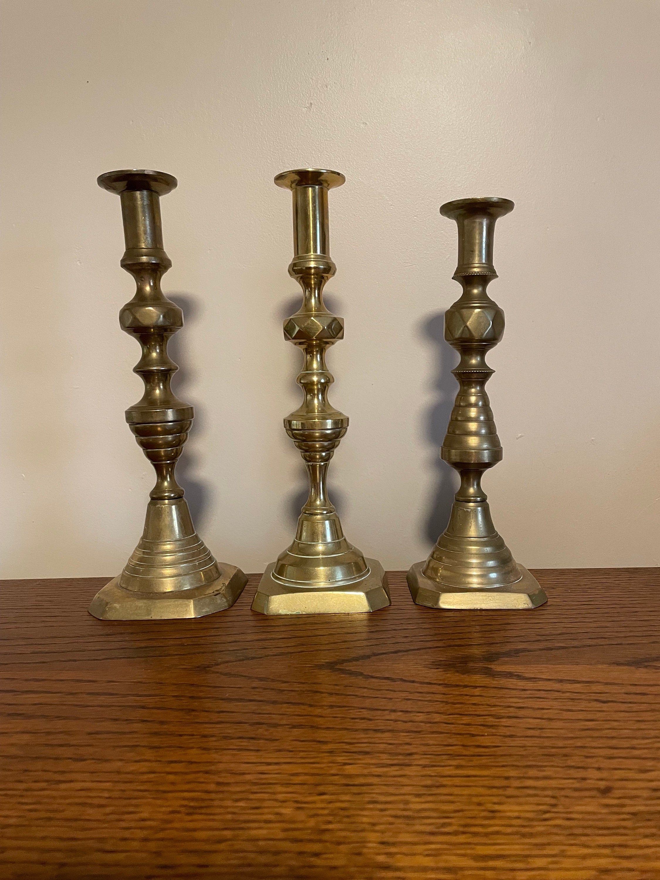 Brass candlestick,with thumb holder, and slide push up, vintage