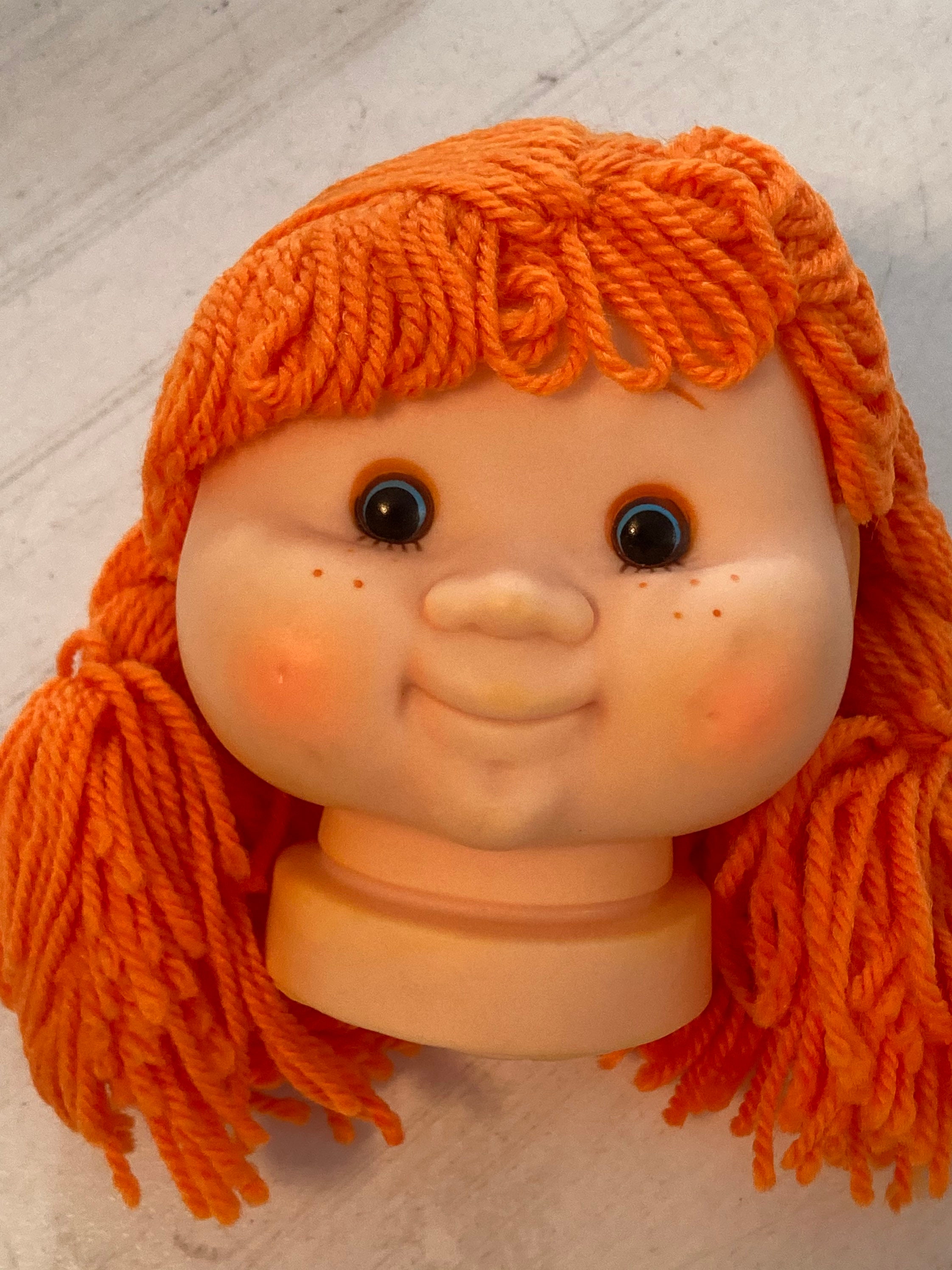 Dolls with cheap string hair