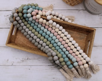 Wood bead garland with tassles, modern farmhouse nursery decor, tiered tray boho decor, white cream, blush pink, blue gray and green garland