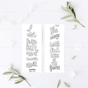 May include: Two black and white printable bookmarks with inspirational quotes. The first bookmark says "I am fearfully and wonderfully made."  The second bookmark says "She laughs without fear of the future."