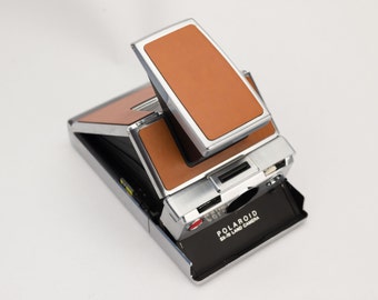 ビィンテージ　皮ケース付きポラロイドカメラSX70カセット無し ビィンテージ皮ケース付きポラロイドカメラSX70カセット無し