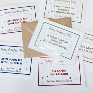 May include: Four Christmas gift vouchers with gold, silver, and red foil accents. The vouchers are for a night stay in London and a theatre show, afternoon tea with the girls, seeing Santa in Lapland, and a night stay in London and a theatre show.