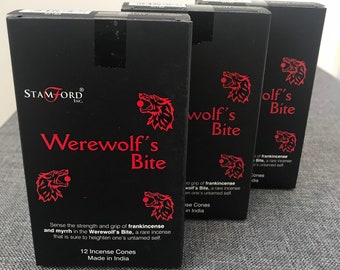 May include: Three black boxes with red wolf illustrations and the text "Werewolf's Bite" on the front. The boxes contain 12 incense cones made in India. The text on the boxes describes the incense as a rare blend of frankincense and myrrh.