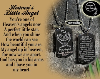 May include: A silver necklace with a black metal dog tag pendant. The front of the tag has an engraved angel wing design and the text "My Angel Gerald Anthony 02/02/2017". The back of the tag has the text "Heaven's Little Angel You're one of Heaven's angels now A perfect little star, And when you shine the world can see How beautiful you are. My angel up in heaven, for now we are apart, God has you in his arms and I have you in my heart."
