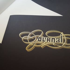 Journal de paysage de feuille d’or, noir