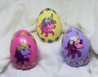 Unicorn wooden egg with flowers Easter or Christmas